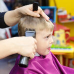 Pigtails And Crewcuts kids getting hair cut